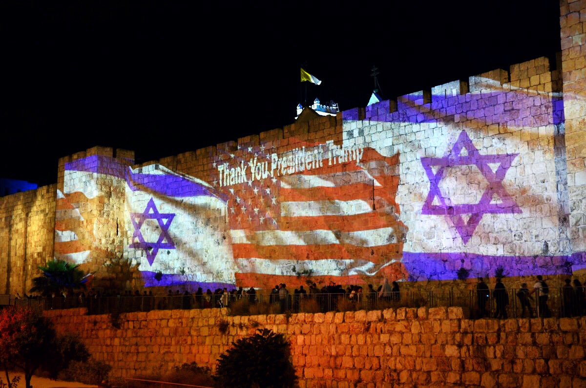 Image credit to: Western wall shows images of solidarity to America and Israel. Joel Pollak / Breitbart News