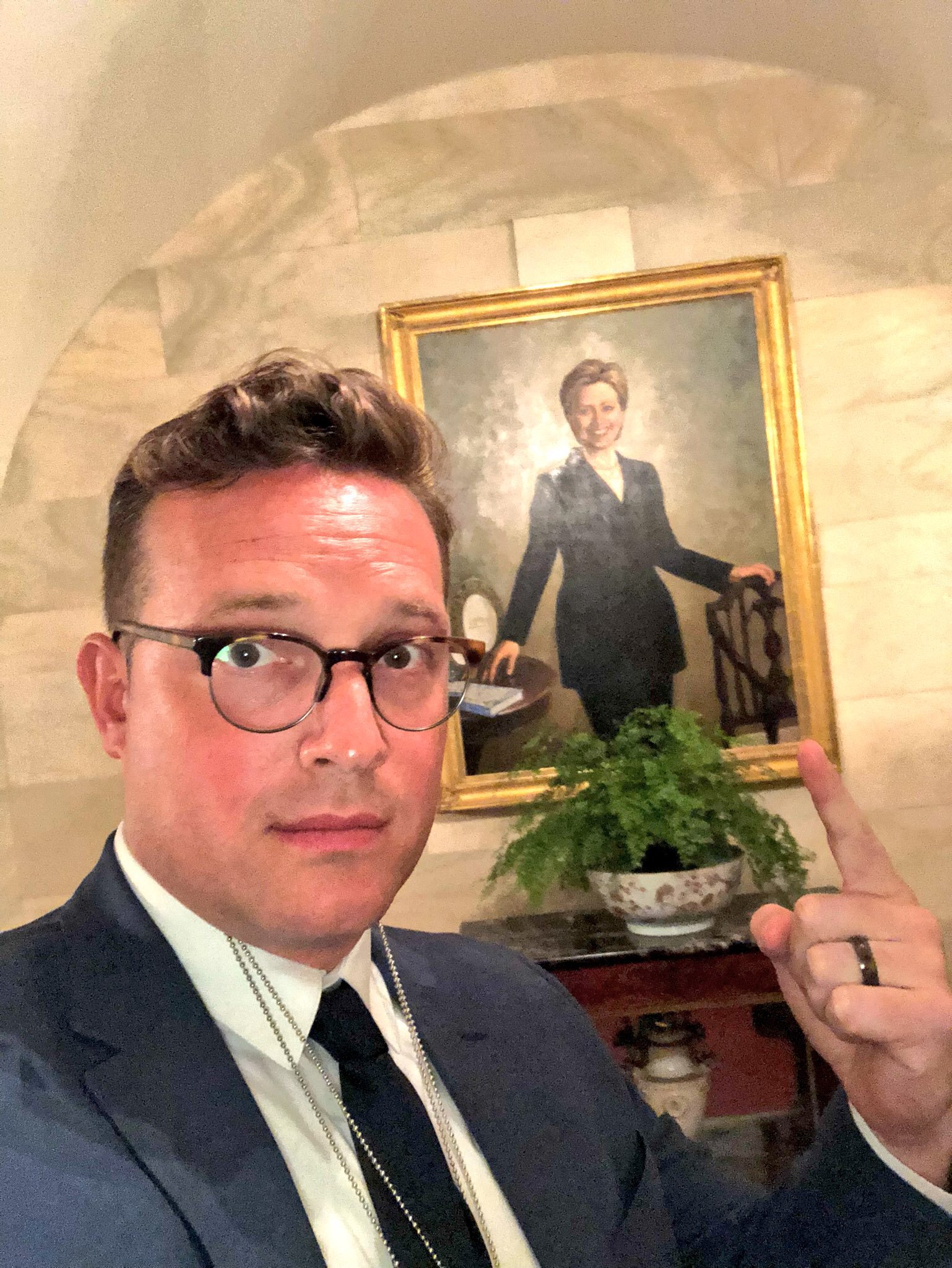 Benny takes a selfie by the Hillary portrait during the journey to the SCOTUS annoucement. Photo credit to Benny Johnson at The Daily Caller. 